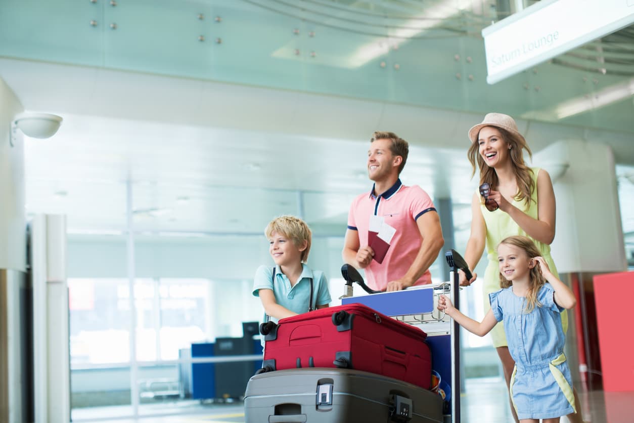 Family in the airport for a move to the United States